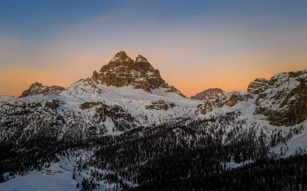 An incredible sunset in the Dolomites Alps in the Tre Cime di Lavaredo national park in january 2020 in Italy. Aerial drone shot — Stock Photo, Image