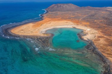 The Isla de Lobos in Fuerteventura, Spain with the Playa de la Concha. Aerial drone shot in october 2019