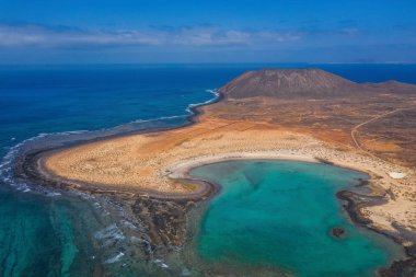 The Isla de Lobos in Fuerteventura, Spain with the Playa de la Concha. Aerial drone shot in october 2019