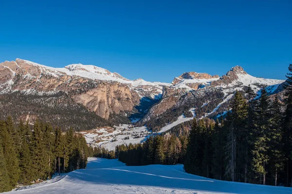 sunny evening over the mountain. In the light of the sun. Ski resort of Selva di Val Gardena, Italy. January 2020