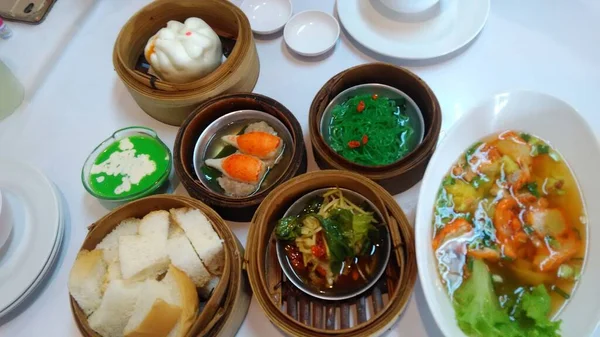 stock image Top view of Dim sum on table. Chinese food style concept.