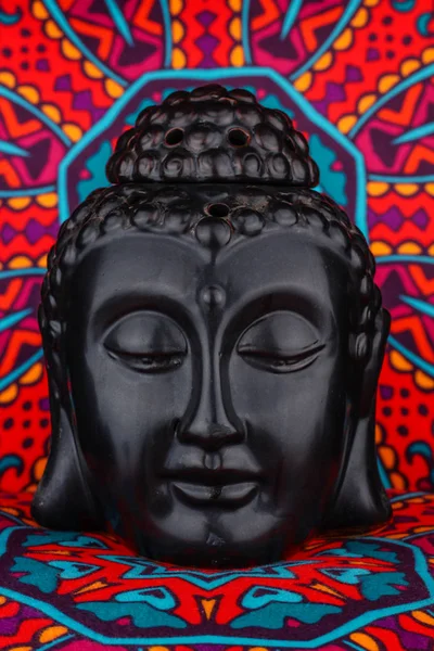 Buddha statue on a colorful background — Stock Photo, Image