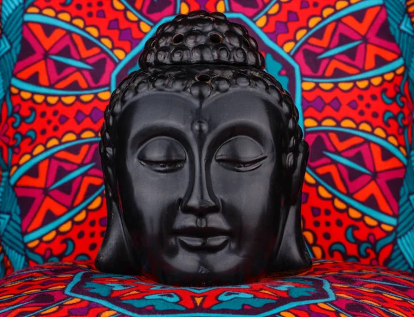 Buddha statue on a colorful background — Stock Photo, Image