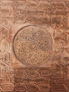 Arabian Oriental Ornamental carvings / An Islamic art of Arabian Oriental decorative ornamental carvings on a wall clipart