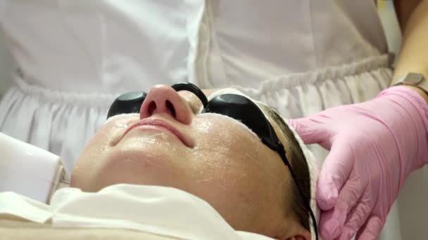 Woman Preparing Laser Rejuvenation Procedure Salon Cosmetologist Dermatologist Completes Photorejuvenation — 图库视频影像