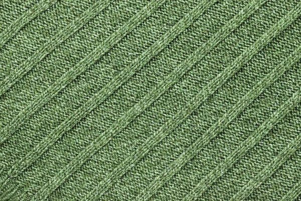 Achtergrond in de vorm van een gebreid product van groene wol — Stockfoto