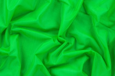 Parlak yeşil naylon kumaş formunda arka plan