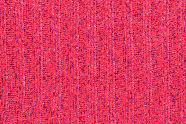 Achtergrond in de vorm van gebreid materiaal van rode wol — Stockfoto