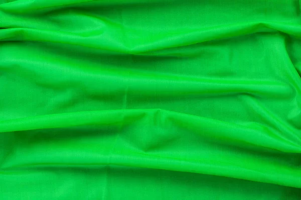 Parlak yeşil naylon kumaş formunda arka plan