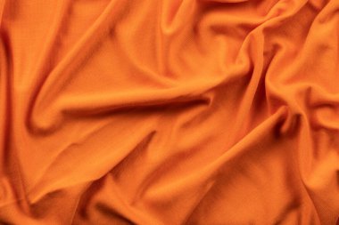 Parlak turuncu renkli keten kumaş şeklinde arkaplan