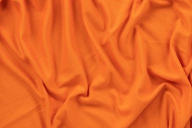 Parlak turuncu renkli keten kumaş şeklinde arkaplan