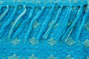 Mavi ve yeşil yünden malzemeler şeklinde arkaplan