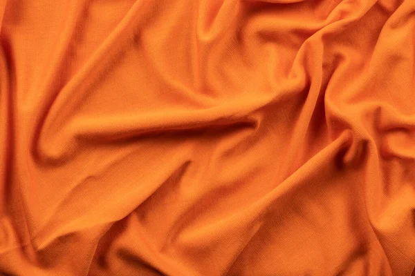 Parlak turuncu renkli keten kumaş şeklinde arkaplan