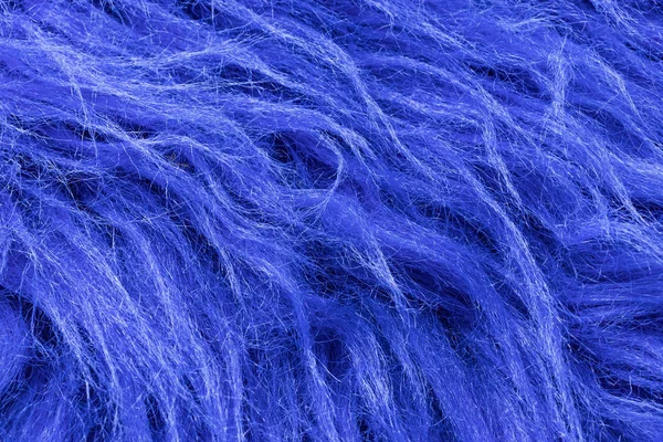 Background in the form of blue faux fur — 스톡 사진