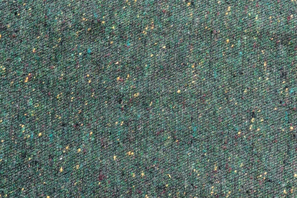 Hintergrund in Form eines grünen Wollprodukts — Stockfoto