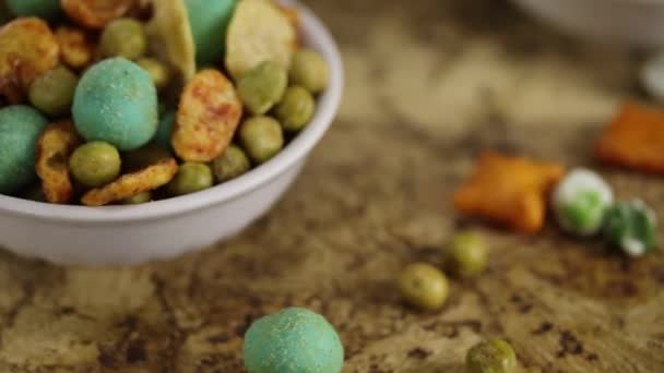 Japanese Hot Snacks Peas Wasabi White Bowl Rotate Counterclockwise Brown — Stock Video