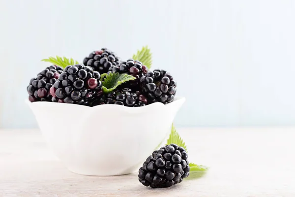 Blackberries in white bowl — Stock Photo, Image