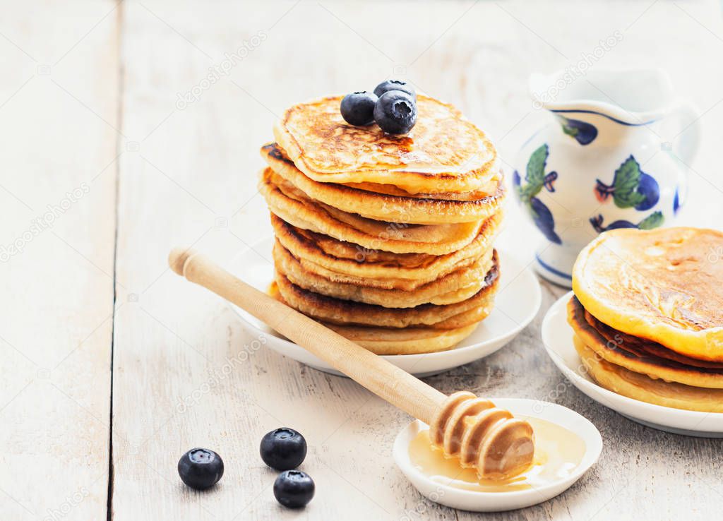 Stack of pancakes with blackberries
