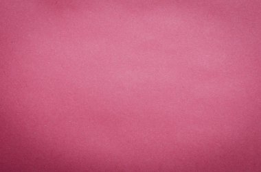 Eskimiş pembe arkaplan desenli kağıt.