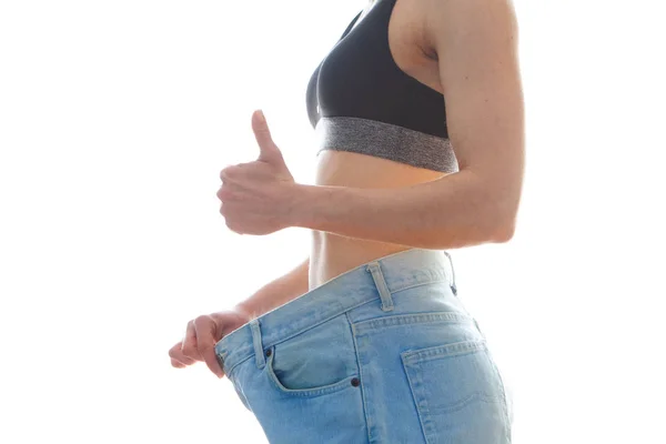 Concept Régime Alimentaire Perte Poids Femme Gros Jeans Sur Fond — Photo