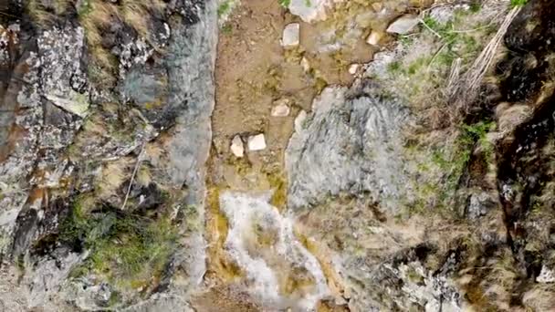 Aerial shooting of a mountain waterfall. Aerial shot taken by drone — Stock Video