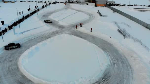 Saransk, Russia - 02/03/2019: Aerial shot of winter drift competition on Lada — Stock Video