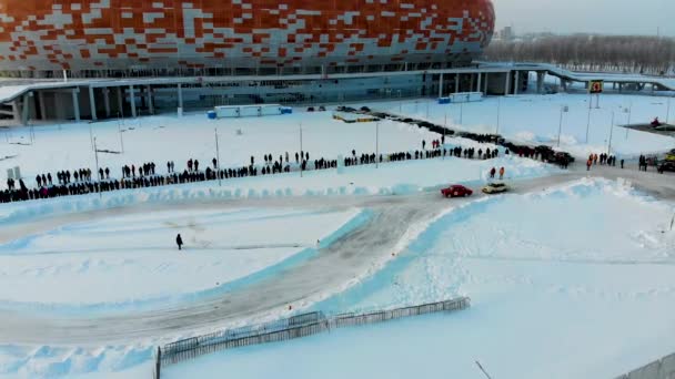 Saransk, Rusia - 02 / 03 / 2019: Aerial shot of winter drift competition on Lada — Vídeos de Stock