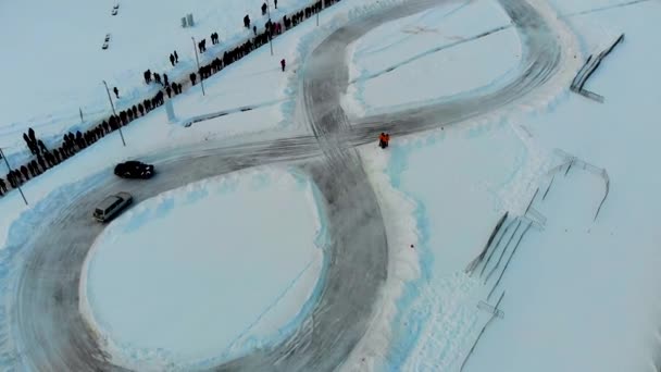 Saransk, Russia - 02/03/2019: Aerial shot of winter drift competition on Lada — Stock Video