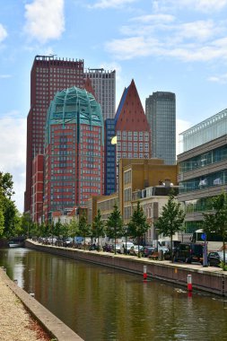 The Hague, Netherlands - September 5, 2019: City landscape - lake, old and modern architecture.