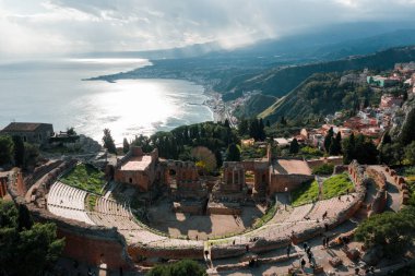 Aerial drone shot of the ancient Greek theatre of Taormina, theatre seen from above clipart