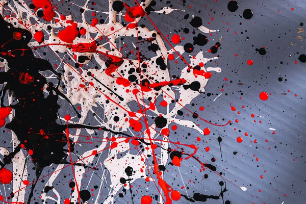 Picture painted using the technique of dripping. Mixing different colors red white black. Lines and spots. Horizontal orientation. — 스톡 사진