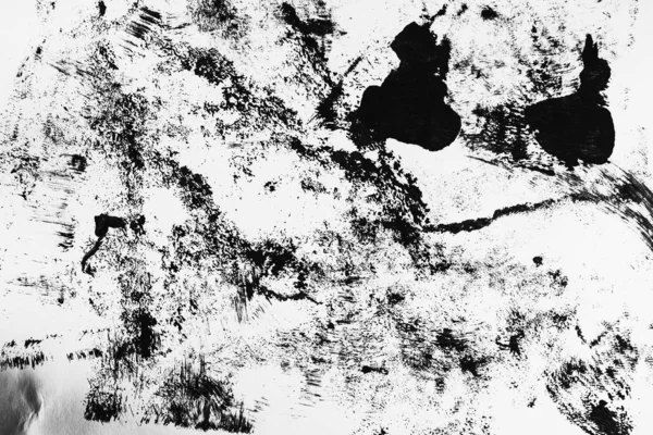Шаблоны черной краски с кисти на белом фоне — стоковое фото