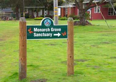 Pacific Grove, CA - Jan 1, 2020: Sign directing to Monarch Grove Sanctuary in Pacific Grove, Monterey. Home to thousands of monarch butterflies during their migration in the winter months.