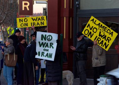 Alameda, CA - Jan 9, 2020: Unidentified Alameda residents protesting the concept of war with Iran.