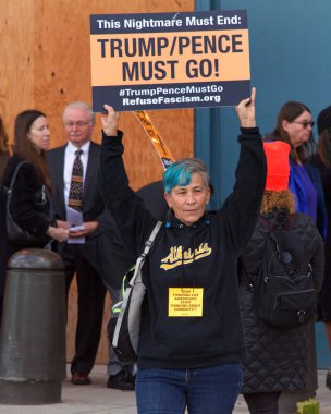 San Francisco, CA - Jan 13, 2020: Unidentified protestors outside the Common Wealth Club where Secretary of State Mike Pompeo is preparing to speak.