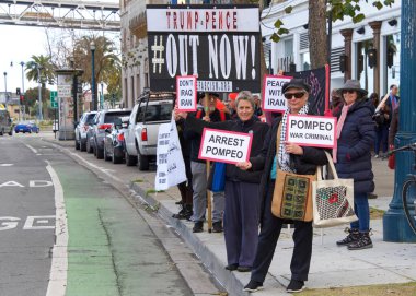 San Francisco, CA - Jan 13, 2020: Unidentified protestors outside the Common Wealth Club where Secretary of State Mike Pompeo is preparing to speak.