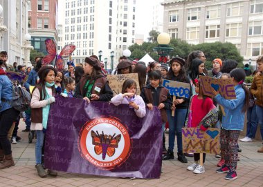 Oakland, CA - Jan 20, 2020: Unidentified participants at the 6th annual rally and march to reclaim the spirit of Martin Luther King Jrs legacy. Starting at Frank Ogawa Plaza and marching down 14th street.