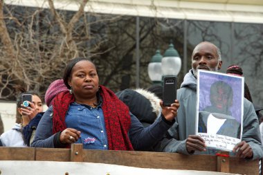 Oakland, CA - Jan 20, 2020: Unidentified participants at the 6th annual rally and march to reclaim the spirit of Martin Luther King Jrs legacy. Starting at Frank Ogawa Plaza and marching down 14th street.