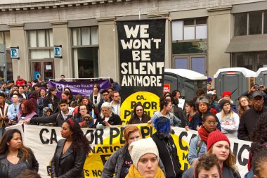 Oakland, CA - Jan 20, 2020: Unidentified participants at the 6th annual rally and march to reclaim the spirit of Martin Luther King Jrs legacy. Starting at Frank Ogawa Plaza and marching down 14th street