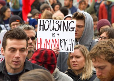 Oakland, CA - Jan 20, 2020: Unidentified participants at the 6th annual rally and march to reclaim the spirit of Martin Luther King Jrs legacy. Starting at Frank Ogawa Plaza and marching down 14th street.