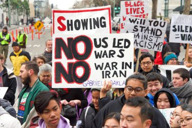 Oakland, CA - Jan 20, 2020: Unidentified participants at the 6th annual rally and march to reclaim the spirit of Martin Luther King Jrs legacy. Starting at Frank Ogawa Plaza and marching down 14th street.