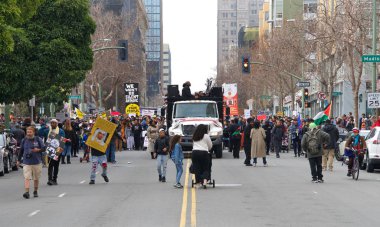 Oakland, CA - Jan 20, 2020: Unidentified participants at the 6th annual rally and march to reclaim the spirit of Martin Luther King Jrs legacy. Starting at Frank Ogawa Plaza and marching down 14th street