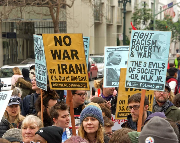 Oakland, CA - Jan 20, 2020: Unidentified participants at the 6th annual rally and march to reclaim the spirit of Martin Luther King Jrs legacy. Starting at Frank Ogawa Plaza and marching down 14th street.