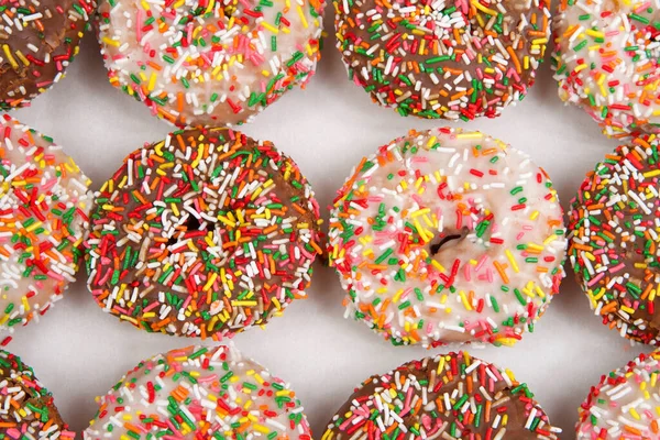 Close Cake Donuts Streusles Chocolate Vanilla Frosting Covered Rainbow Streusel — Stockfoto