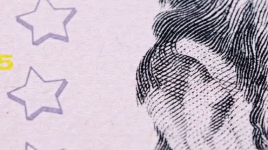 Beş dolarlık banknotun kayan videosu.