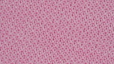 Tekstil arka planı% 100 pembe pamuklu kumaş. Makro atış