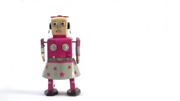 Beyaz arka planda izole edilmiş klasik bir robot oyuncak..