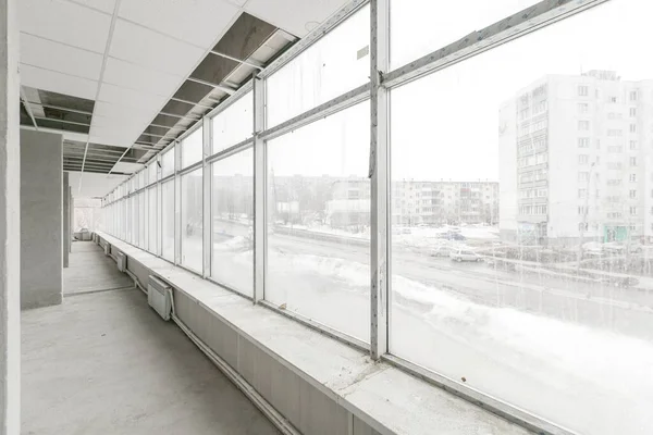 empty pure commercial office building undecorated in gray colors.open space office