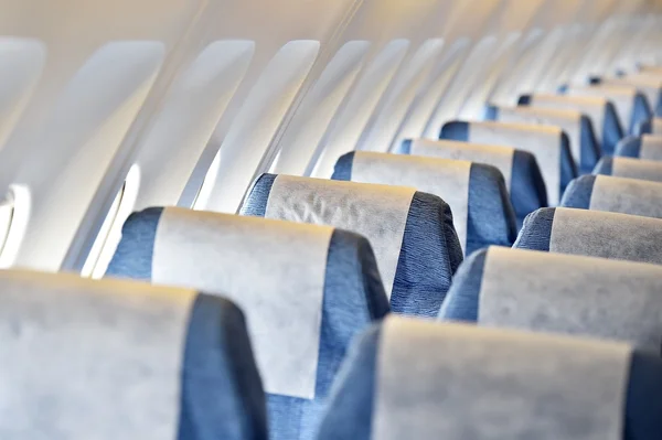 Avión azul asientos vacíos — Foto de Stock