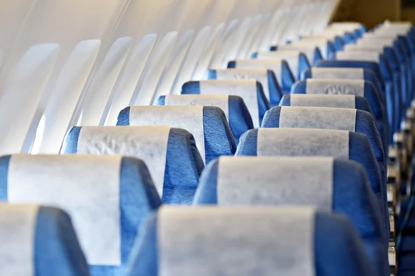 Avión azul asientos vacíos — Foto de Stock